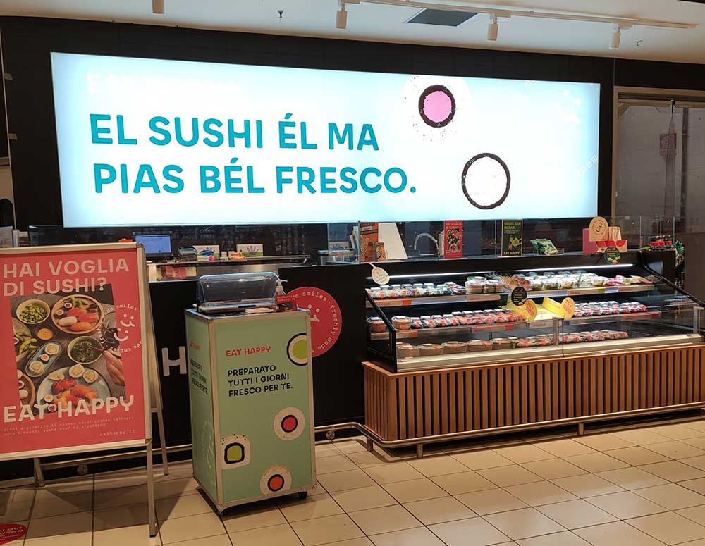 cartello supermercato sushi e dialetto bresciano